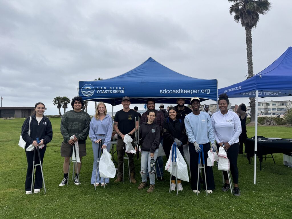 Group cleanup at a San Diego Coastkeeper booth — Black Tech Link BIPOC Coastal Research Program (BCRP)
