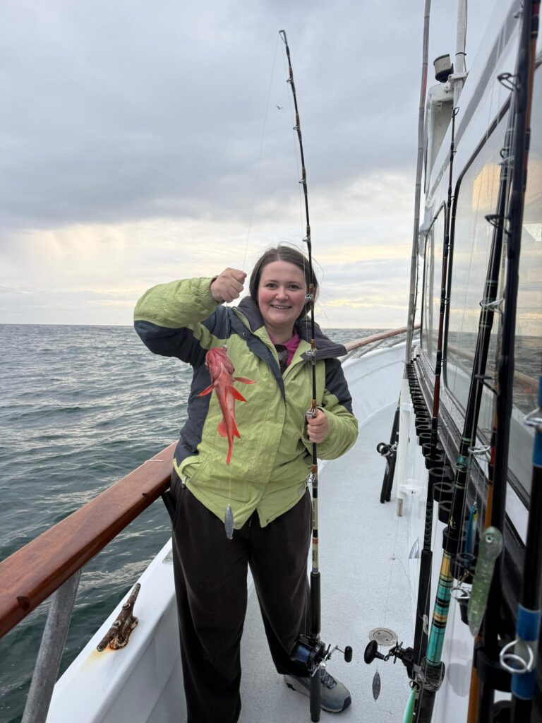 Student fishing on a research boat — Black Tech Link BIPOC Coastal Research Program (BCRP)